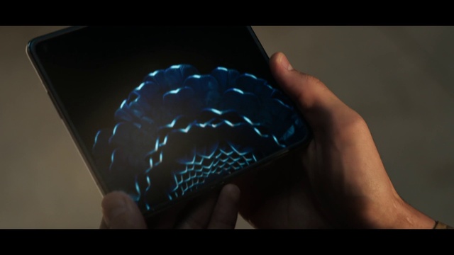 Video Reference: Helmet, Cap, Sports gear, Gesture, Finger, Art, Electric blue, Thumb, Pattern, Nail