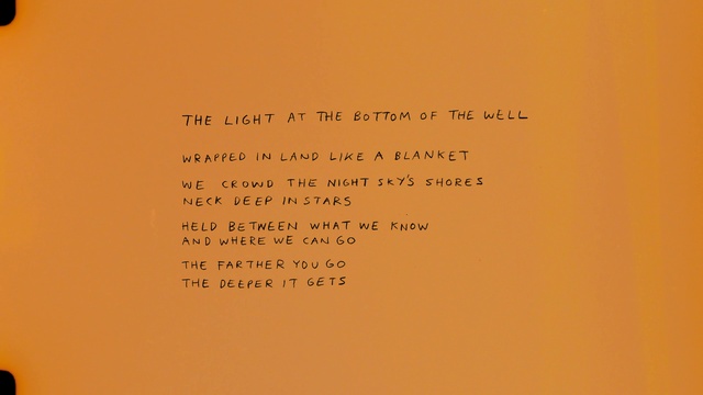 Video Reference: Brown, Font, Peach, Symmetry, Parallel, Rectangle, Paper, Circle, Paper product, Event