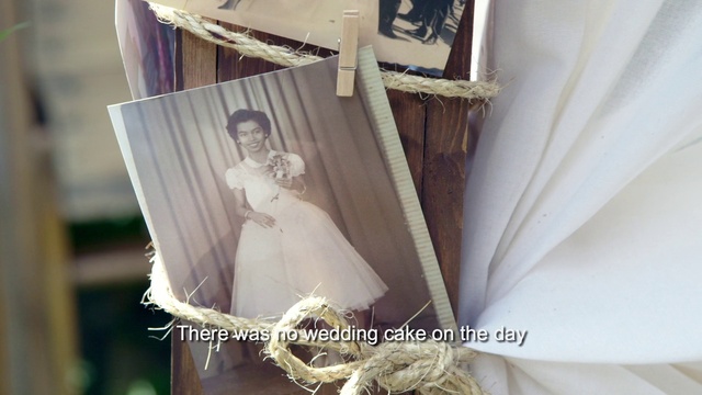 Video Reference: Clothing, Dress, Textile, Sleeve, Wedding dress, Flash photography, Bridal clothing, Gown, Bridal party dress, Fashion design