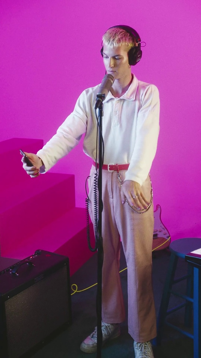 Video Reference: Microphone, Purple, Musician, Hat, Artist, Entertainment, Microphone stand, Audio equipment, Music, Performing arts