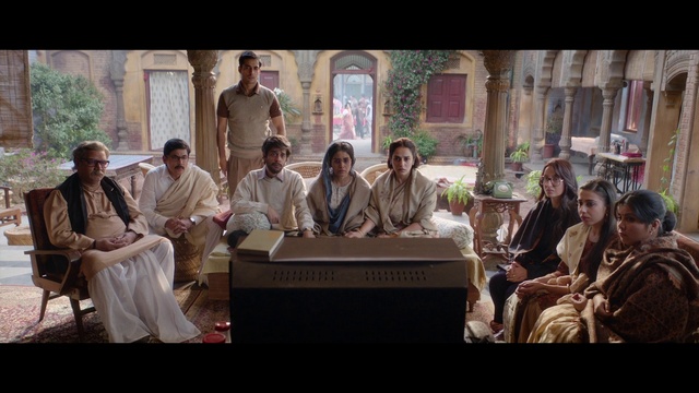 Video Reference: Fashion, Temple, Adaptation, Plant, Event, Sitting, Room, Table, Conversation, Religious institute