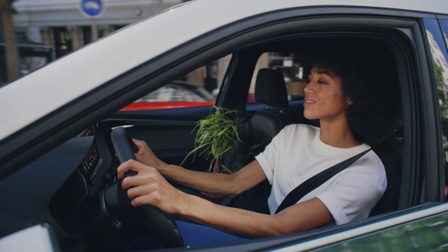 Video Reference: Car, Vehicle, Motor vehicle, Dress, Automotive design, Automotive mirror, Steering wheel, Steering part, Car seat cover, Automotive exterior