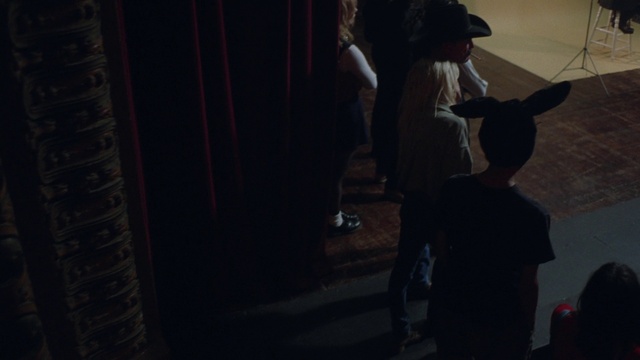 Video Reference: Flash photography, Gesture, Event, Midnight, Curtain, Darkness, Entertainment, Human leg, Flooring, Room