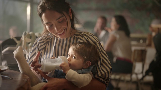 Video Reference: Gesture, Happy, Smile, Baby, Toddler, Fun, Child, Event, Sitting, Chair