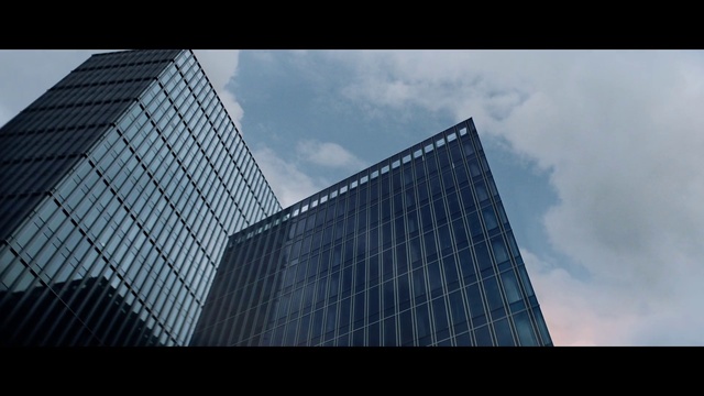 Video Reference: Cloud, Sky, Building, Skyscraper, Rectangle, Tower block, Urban design, Facade, Tints and shades, Condominium