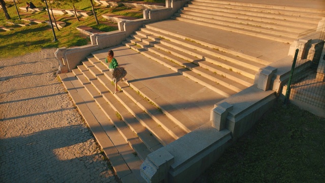 Video Reference: Wood, Flooring, Floor, Road surface, Urban design, Grass, Outdoor furniture, Leisure, Landscape, Tints and shades