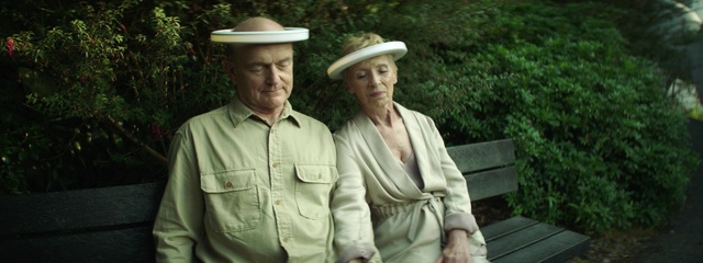 Video Reference: Hat, Standing, Gesture, Grass, Headgear, People in nature, Plant, Dress shirt, Sun hat, Tree