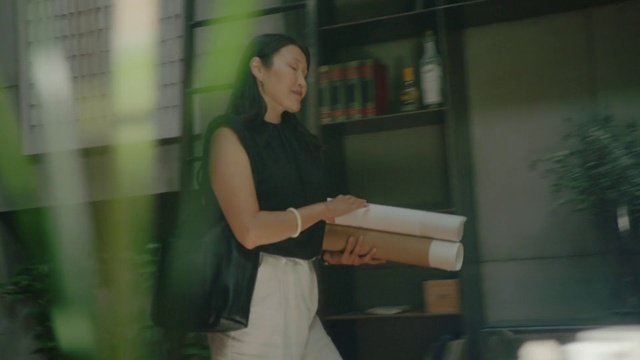 Video Reference: Lectern, Shelf, Bookcase, Event, Podium, Room, Elbow, Job, Sitting, Fashion design