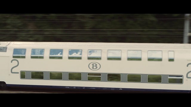 Video Reference: Rectangle, Font, Automotive exterior, Gas, Facade, Symmetry, Signage, Parallel, Number, Event