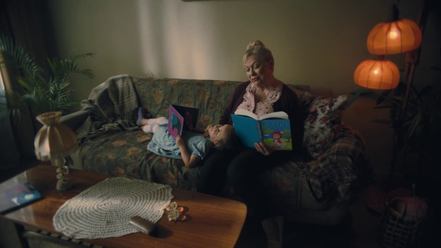 Video Reference: Furniture, Comfort, Lighting, Picture frame, Couch, Plant, Table, Living room, Lamp, Houseplant