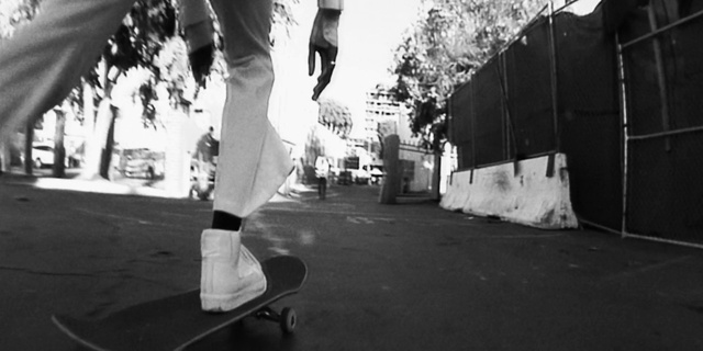Video Reference: White, Leg, Black, Flash photography, Asphalt, Shorts, Standing, Black-and-white, Grey, Style