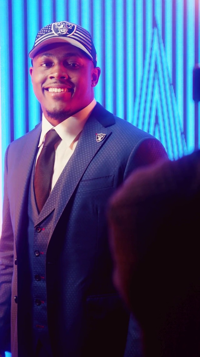 Video Reference: Chin, Smile, Tie, Dress shirt, Cap, Sleeve, Collar, Baseball cap, Cool, Entertainment