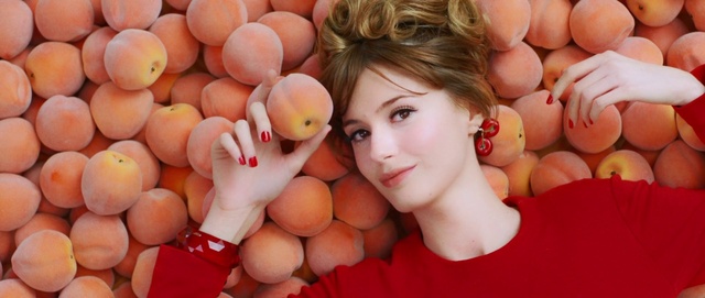 Video Reference: Nose, Skin, Facial expression, Muscle, Orange, Dress, Eyelash, Happy, Gesture, Finger