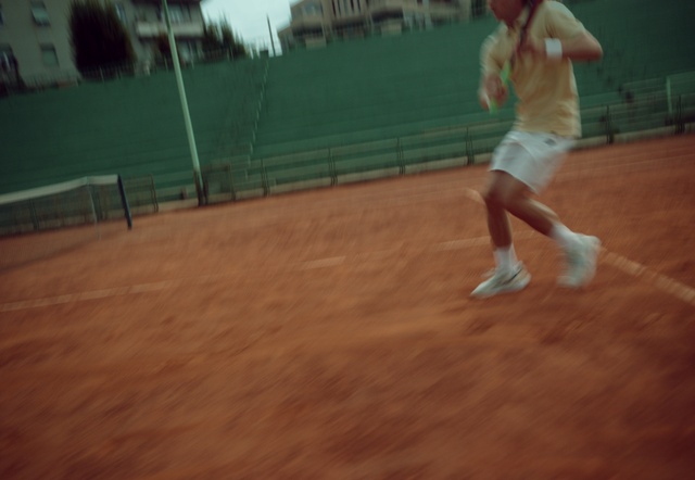 Video Reference: Shorts, Tennis player, Racquet sport, Sports equipment, Soft tennis, Tennis Equipment, Sports, Leisure, Grass, Tennis court