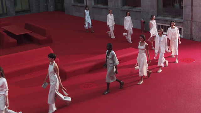 Video Reference: Window, Entertainment, Pink, Performing arts, Red, Magenta, Event, Flooring, Performance art, Uniform
