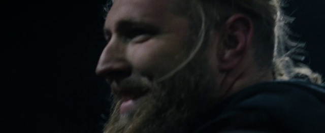 Video Reference: Nose, Jaw, Ear, Eyelash, Audio equipment, Beard, Microphone, Facial hair, Darkness, Event