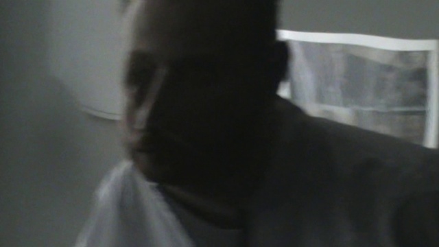 Video Reference: Gesture, Beard, Eyelash, Whiskers, Darkness, Fur, Eyewear, Formal wear, Facial hair, Shadow