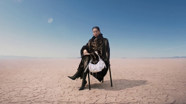 Video Reference: Sky, Landscape, Aeolian landform, Travel, Horizon, Recreation, Sitting, Sand, Happy, Boot