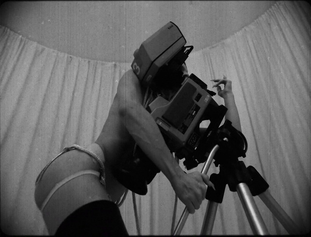 Video Reference: Videographer, Flash photography, Photographer, Camera lens, Camera, Style, Black-and-white, Video camera, Digital camera, Audio equipment