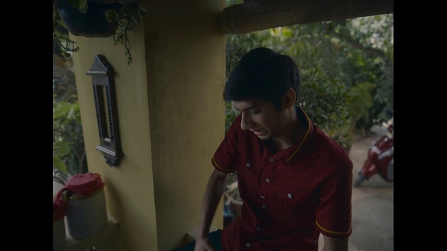 Video Reference: Window, Happy, T-shirt, Fun, Leisure, Room, Tree, Visual arts, Sitting, Jewellery