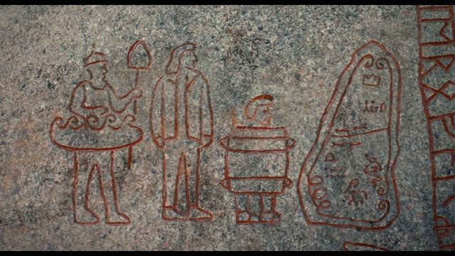Video Reference: stone, carving, drawing, red lines, symbols, figures, graffiti, rock surface, ancient art, etching, abstract, people, geometric shapes, mural, close-up