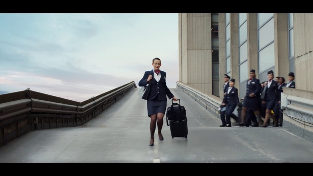 Video Reference: Footwear, Cloud, Sky, Flash photography, Gesture, Street fashion, Travel, Suit, Formal wear, White-collar worker