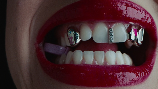 Video Reference: Eyebrow, Liquid, Tooth, Mouth, Human body, Jaw, Smile, Fluid, Purple, Nail
