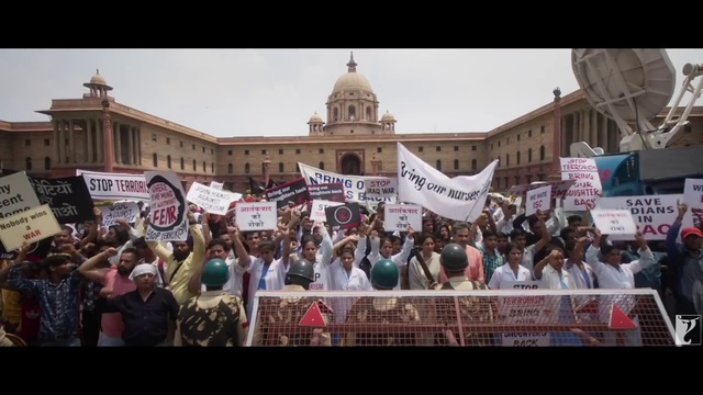 Video Reference: Building, Human, Sky, Event, Crowd, Font, City, Rebellion, Public event, Tourism