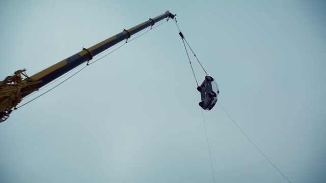 Video Reference: Sky, Street light, Recreation, Crane, Electricity, Rope, Electric blue, Stunt performer, Cable car, Public utility