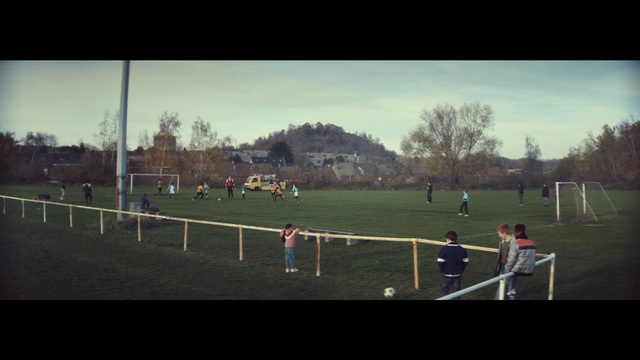 Video Reference: Cloud, Sky, Sports equipment, Plant, Tree, Player, Football, Grass, Ball game, Competition event