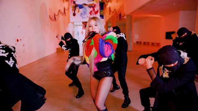Video Reference: Shorts, Textile, Entertainment, Pink, Fun, Leisure, Performing arts, Magenta, Luggage and bags, Fashion design