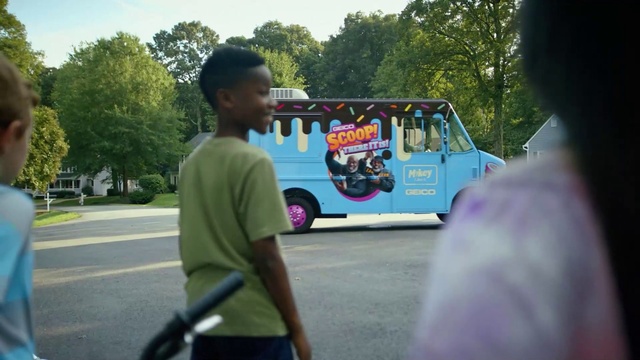 Video Reference: Bus, Shorts, Tire, Motor vehicle, Tree, Vehicle, Sky, Plant, Wheel, Automotive exterior