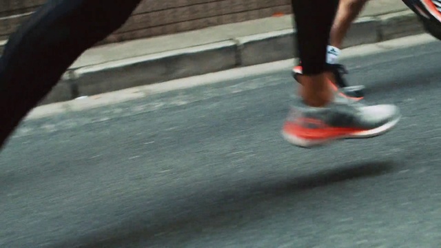Video Reference: Asphalt, Road surface, Grey, Human leg, Road, Walking shoe, Thigh, Recreation, Flooring, Knee