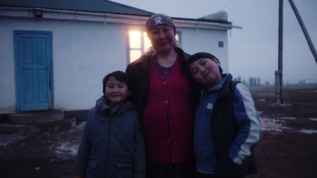 Video Reference: Clothing, Smile, Outerwear, Door, Flash photography, Sky, Jacket, House, Travel, Happy