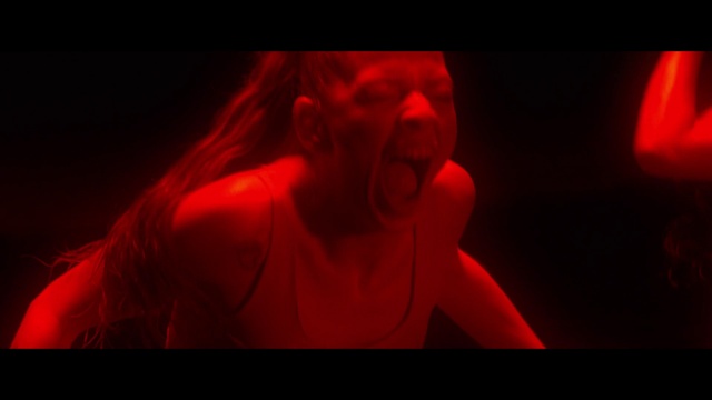 Video Reference: Mouth, Flash photography, Gesture, Font, Performing arts, Magenta, Entertainment, Event, Darkness, Graphics