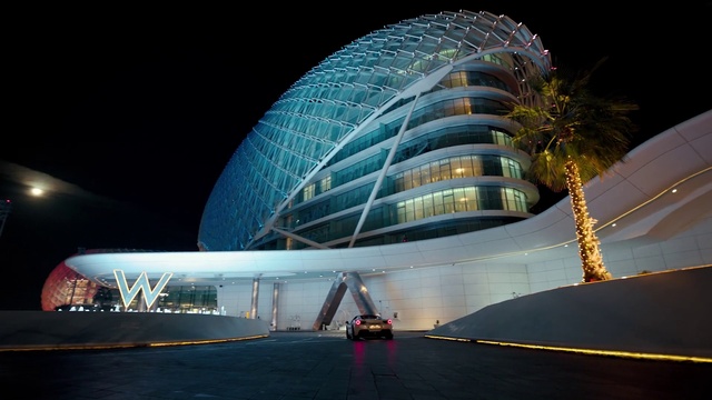 Video Reference: Building, World, Sky, Commercial building, Facade, City, Metropolitan area, Automotive lighting, Tower block, Metropolis