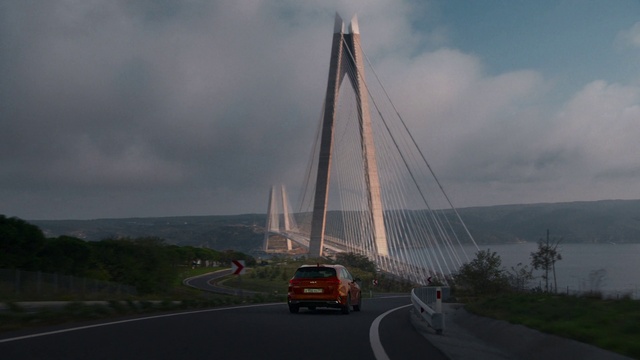 Video Reference: Cloud, Sky, Car, Vehicle, Road surface, Tree, Wheel, Plant, Thoroughfare, Asphalt