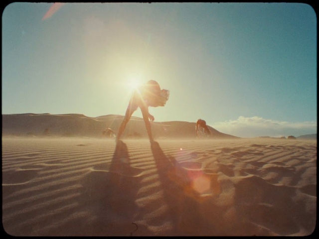 Video Reference: Sky, Ecoregion, People in nature, Gesture, Sunlight, Flash photography, Travel, Cloud, Body of water, Atmospheric phenomenon