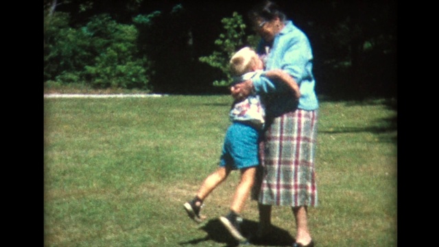 Video Reference: Plant, Shorts, People in nature, Leaf, Tartan, Gesture, Grass, Leisure, Fun, Tree