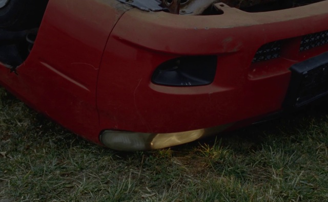 Video Reference: Vehicle, Automotive lighting, Hood, Vehicle registration plate, Automotive tire, Motor vehicle, Plant, Grass, Automotive design, Automotive tail & brake light