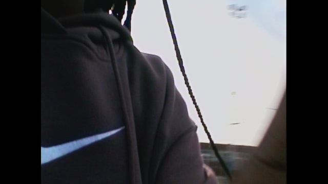 Video Reference: Sleeve, Blazer, Audio equipment, Tints and shades, Suit, Formal wear, Darkness, Fashion accessory, Backlighting, Vehicle door