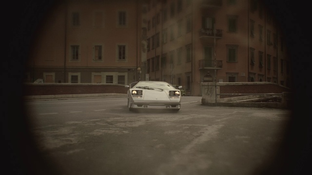 Video Reference: Window, Building, Hood, Vehicle, Automotive lighting, Automotive tire, Car, Tire, Road surface, Asphalt