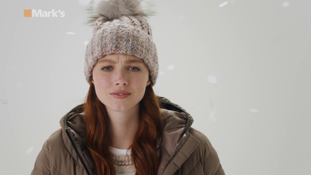 Video Reference: Clothing, Face, Lip, Smile, Outerwear, Eyebrow, Eye, Cap, Facial expression, Flash photography