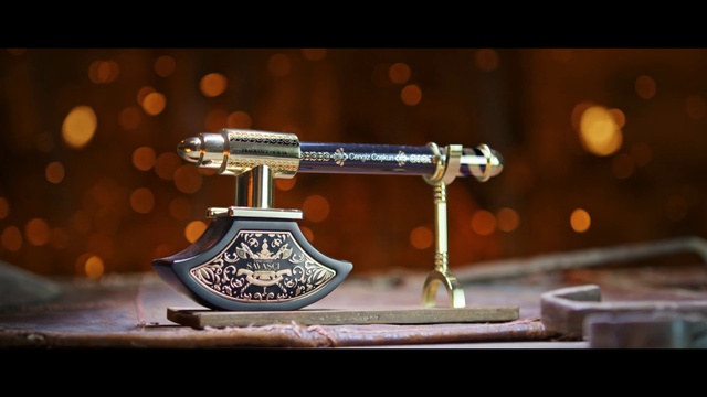 Video Reference: Sewing machine, Font, Wood, Household appliance accessory, Metal, Machine, Art, Titanium, Plucked string instruments, Still life photography