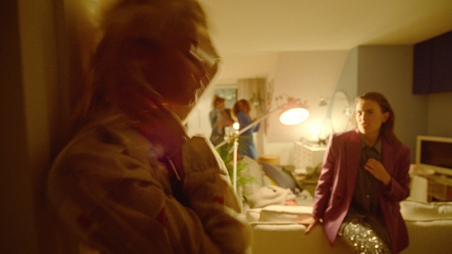 Video Reference: Smile, Fun, Event, Happy, Room, Conversation, Sitting, Magenta, Lighting accessory, Luggage and bags