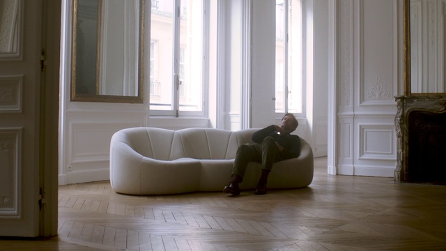 Video Reference: Couch, Furniture, Comfort, Wood, studio couch, Interior design, Window, Floor, Beige, Flooring