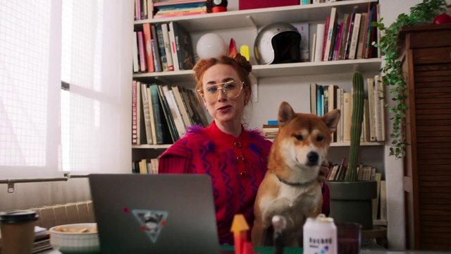 Video Reference: Glasses, Bookcase, Dog, Laptop, Shelf, Computer, Personal computer, Table, Book, Dog breed