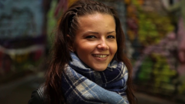 Video Reference: Smile, Lip, Facial expression, Flash photography, Happy, Plant, Wood, Jacket, Street fashion, Grass