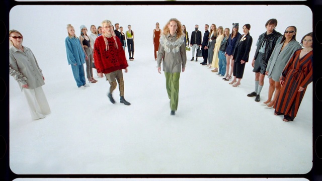 Video Reference: Sleeve, Gesture, Art, Fashion design, Blazer, Formal wear, Event, Electric blue, Painting, Visual arts