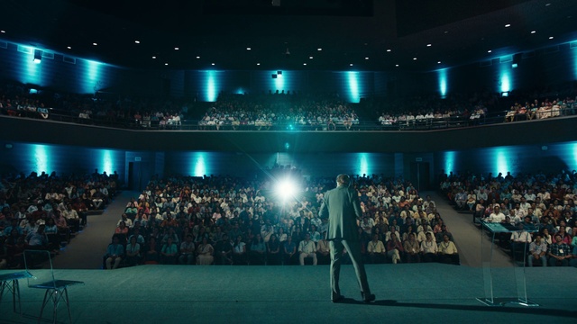 Video Reference: Chair, Entertainment, Performing arts, Concert, Crowd, Event, Stage equipment, Performance art, Performing arts center, Stage